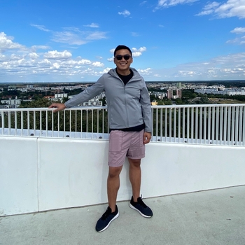 Carlo Aguinaldo smiling on top with a view, Digital Marketing SEO strategist and expert
